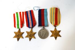 Four unnamed WWII medals, comprising: The Italy Star, The Africa Star, The 1939-45 Star,