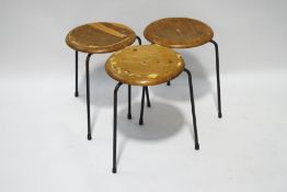 A set of three 1950s/60s Danish stools, with plywood seats and metal legs, stamped 'FH' Denmark,