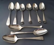 A pair of late George III silver table spoons; five bottom marked table spoons;
