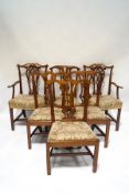 A harlequin set of six 19th century dining chairs, including two carvers,