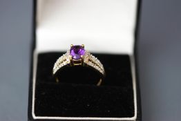 A 9 carat gold amethyst and diamond ring, finger size p1/2, 3.