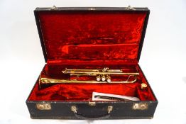 A Getzen 300 Series brass trumpet, numbered K88967,