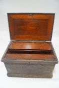 A large metal bound strong box with mahogany interior and drawers,
