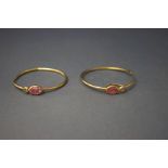 A pair of stone set hoop earrings, stamped '750,