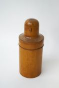 A treen bottle holder, the lid stamped Maw Son & Thompson,