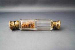 A Victorian silver gilt mounted double ended glass scent bottle, 12.