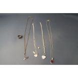 A small collection of silver and silver coloured jewellery