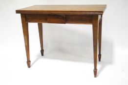 A late Victorian oak tea table,