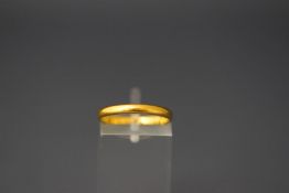 A 22 carat gold wedding ring, 2.