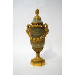 A French onyx and gilt metal incense burner and cover, cast with satyr heads and grape vines,