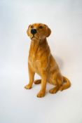 A large Beswick figure of a seated golden Labrador, no.