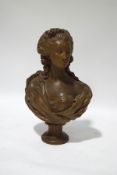 A 19th century terracotta bust of Marie Antoinette, on socle base,