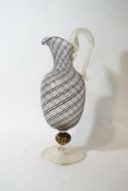 A Murano glass ewer, with black and gold aventurine swirl decoration, signature to foot, 32.
