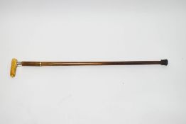 A walking stick with ivory handle and 1" wide silver collar (London 1908)
