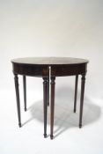 A pair 19th Century demi lune mahogany tables,