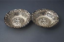 A pair of silver bonbon dishes, by Mappin Brothers, Birmingham 1900, of circular outline,