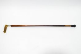 A Malacca walking stick with horn handle and 1.5" silver collar engraved "J.