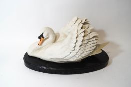 A Franklin Porcelain model of 'The Silent Swan', designed by Ronald van Ruyckevelt,