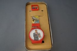 A James Bond 'You only Live Twice' plastic wrist watch, the case with the motto '...
