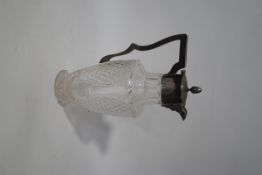 A silver mounted and glass cut claret jug, marks rubbed, circa 1903,