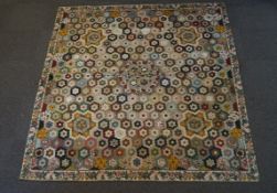 A late Victorian patchwork bedcover,