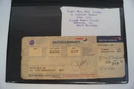 A David Beckham signed flight ticket, and a boarding pass,