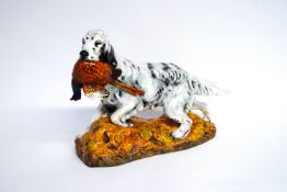 A Royal Doulton figure of an English Setter with a pheasant,