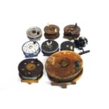 A collection of fishing reels,