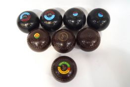 A set of four lawn bowls by Hensell & Sons, Australia,