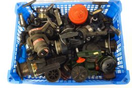 A box of fixed spool fishing reels and spare spools (sea & river)