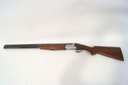A Fabarn 12 gauge over and under shot gun, double trigger extractor (hardly used),