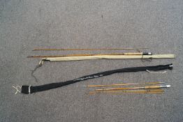 A Norris 9' split cane fishing rod,