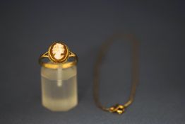 A 9 carat gold shell cameo ring; and a box link bracelet, stamped '375'; 3.