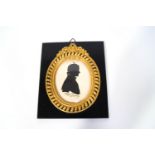 A 20th century silhouette of a Sybil Thorndike, signed indistinctly in pen,