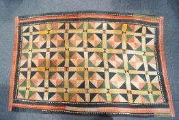 A late 19th century patchwork quilt,