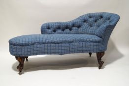 A Victorian mahogany button back chaise longue, serpentine shaped seat on carved cabriole legs,