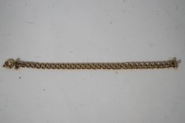 A 9 carat gold bracelet, of hollow links, 22 cm long; 8.