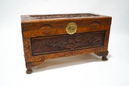 A Chinese carved camphor wood chest,