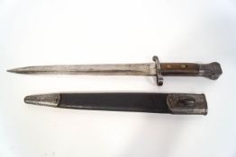 A Victorian bayonet with leather and metal scabbard,