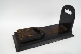 A Victorian rosewood and brass mounted book slide,