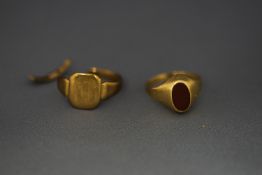 A 9 carat gold signet ring, shank cut; and a sardonyx signet ring, stamped '9ct'; 4.