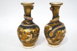 A pair of late 19th/early 20th century Japanese Satsuma earthenware vases,