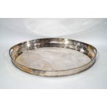 A large oval silver plated gallery tray, with cut out handles,