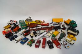 A quantity of die-cast and other vehicles, Britains, Lesney, Corgi,