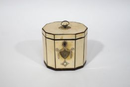 A George III ivory and tortoiseshell ten sided tea caddy, the lid with mother of pearl inlay,