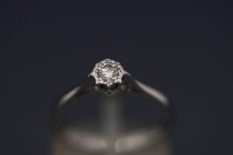A single stone diamond ring, the white mount stamped '18ct',