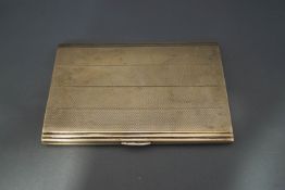 A silver cigarette case, with engine turned decoration, 193 g (6.