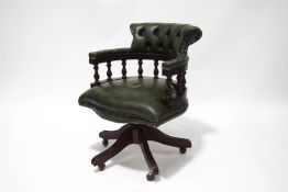 A 20th century Chesterfield Captain's swivel chair,