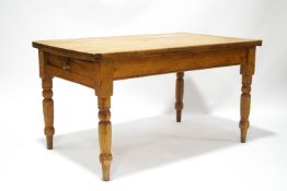 A Victorian pine table with one frieze drawer on turned legs, 73cm high x 82cm wide x 133.
