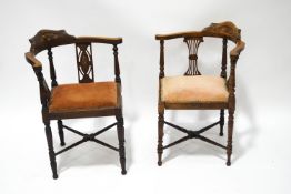 Two Edwardian mahogany corner chairs, each with inlaid backs,
